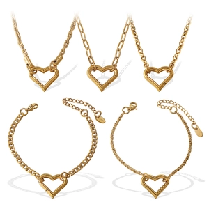 Gold hollow heart necklace and bracelet set in stainless steel with assorted link chains