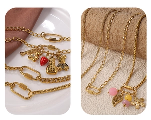 Détails de colliers dorés superposés avec pendentifs ours et fermoir mousqueton