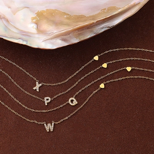 Luxury 18K gold-plated stainless steel initial necklace with zircon paving and heart charm