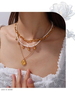 Three-layer 18K gold plated necklace set with pearls, star charms, and coin pendant