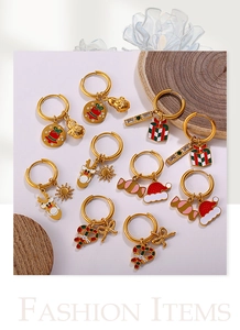 Detail of Christmas earrings set with 18K gold plating and colorful holiday charms