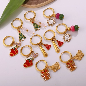 Gold Christmas earrings set with tree, snowflake, and sock charms in festive designs