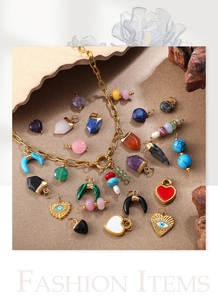 Detail of 18K gold chain with colorful natural stone and heart enamel pendants