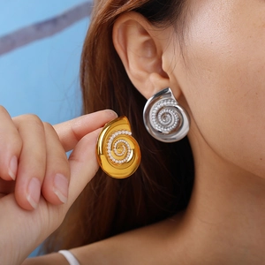 Vintage nautilus shell stud earrings in 18K gold and silver with pearl spiral inlay