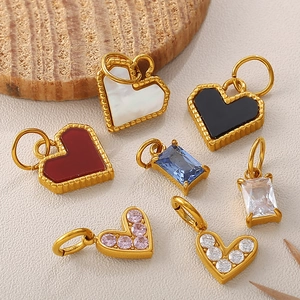 Various 18K gold plated fish and heart pendants with enamel and sparkling stones