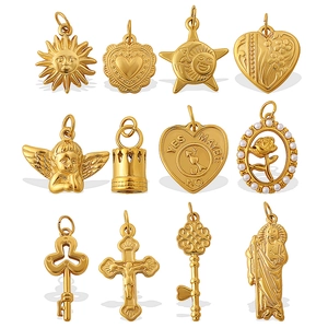 Golden vintage marine style charms including heart, sun, and moon in 18K gold plated steel