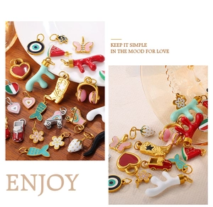 Detailed macro view of mixed colorful enamel charms with 18K gold-plated stainless steel base