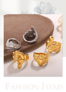 Detailed view of organic irregular lava textured rings in gold and silver finish