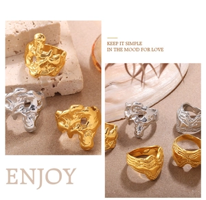 Irregular lava texture gold and silver rings displayed on natural stone and shell backgrounds