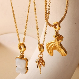 18K gold plated stainless steel necklaces with bear, horse, and pearl cluster pendants