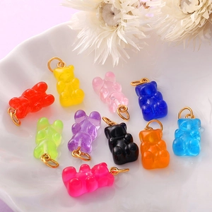 Colorful resin gummy bear charms set in ten vibrant colors with golden metal rings