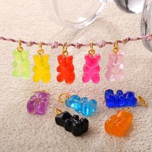 Colorful resin gummy bear pendants in ten vibrant colors with gold hanging rings