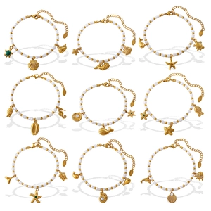 18K gold plated ocean theme bracelet set featuring freshwater pearls and marine charms