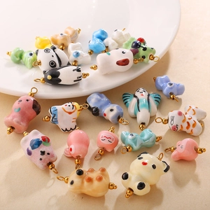 Handcrafted animal ceramic beads including panda and cat figures for DIY accessories