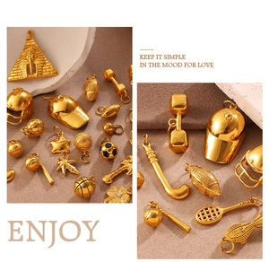 Macro view of gold sport-themed charms including soccer and basketball for DIY jewelry
