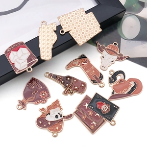 Flat lay of Western themed alloy charms featuring cowboy hats and boots for DIY jewelry