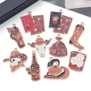 Detailed set of 11 wild western cowboy charms with hats, skulls, and revolvers for DIY jewelry