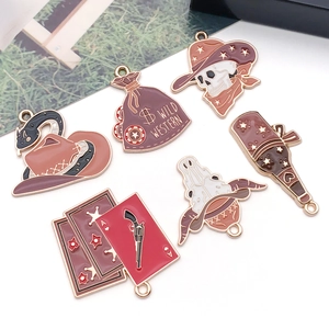 Enamel alloy charms featuring cowboy skull, wild western money bag, and snake hats