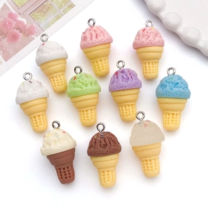 Flat lay of 10 colorful resin ice cream cone charms with metal rings for DIY jewelry