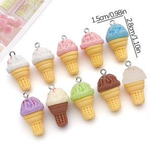 Macro view of assorted 15x28mm resin ice cream cone charms with metal loops