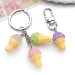 Detail showing colorful resin ice cream cone charms with silver keyrings and lobster clasps