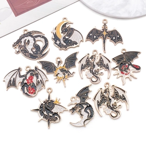 Detailed set of nine gold-plated dragon enamel charms for DIY jewelry and necklaces
