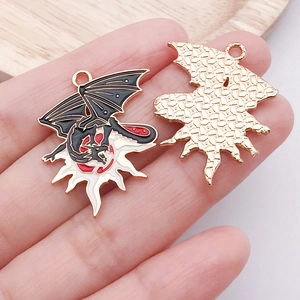 Detail of DIY dragon alloy pendant with enamel oil drop process and golden metal plating