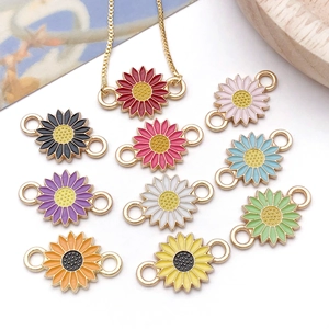 Detailed macro of colorful daisy flower pendants with enamel finish for DIY jewelry