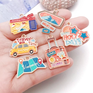 Travel themed enamel alloy pendants featuring suitcase and taxi shapes for DIY jewelry making