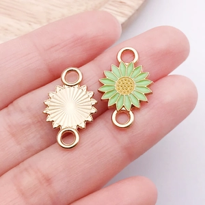 Detailed front and back view of colorful daisy enamel connectors for DIY jewelry making
