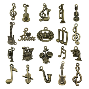Set de 20 colgantes de instrumentos musicales en bronce antiguo para joyería DIY