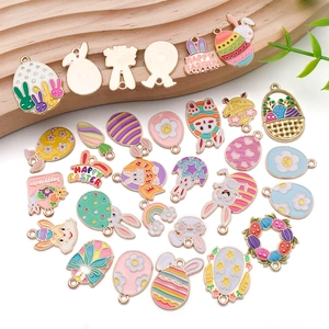 Macro shot of colorful Easter alloy oil drop charms with bunny and egg designs