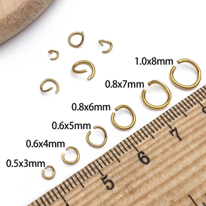Golden stainless steel jump rings in various sizes from 3mm to 8mm for DIY jewelry making
