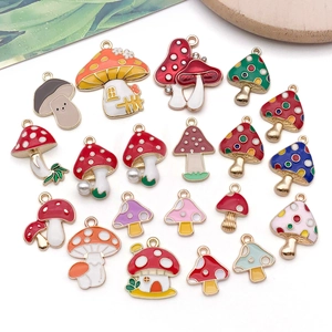 Detail of twenty colorful enamel mushroom charms for DIY necklaces and jewelry making