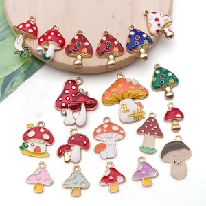 Macro shot of colorful mushroom pendants with enamel coating and alloy base for jewelry