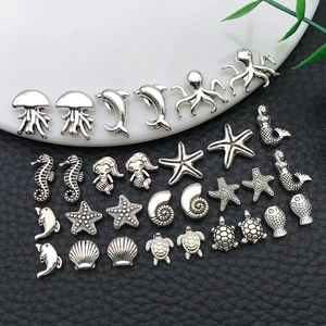Antiek zilveren zeedier bedeltjes met zeepaardjes en zeesterren voor DIY sieraden maken