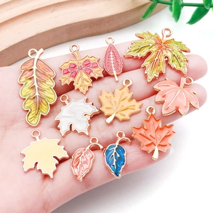 Colorful maple and oak leaf enamel charms with gold edges for DIY jewelry making