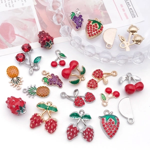 Detail of fruit charms including strawberry and cherry with alloy enamel and rhinestones