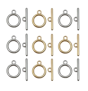 Macro display of mini OT toggle clasps for jewelry making in gold and silver finishes