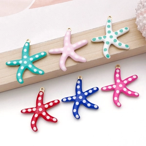 Detailed view of colorful stainless steel starfish pendants for DIY jewelry making crafts