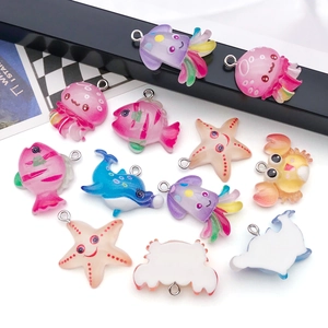 Detail of colorful resin ocean animal charms for DIY jewelry making and pendants