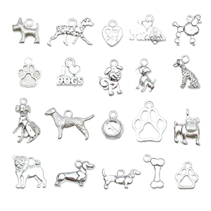 Silver dog themed charm set with paw and bone designs for DIY jewelry and necklaces