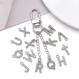 Silver alphabet charms with rhinestones featuring high gloss spring clasp decoration