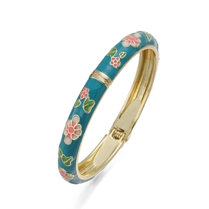 Detail view of vintage cloisonne daisy spring bracelet with blue enamel floral design