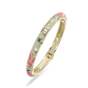 Macro shot of vintage cloisonné enamel flower bracelet with gold hinge and clasp