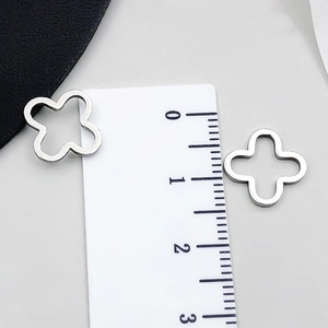 Silver hollow four-leaf clover stainless steel charm pendant for DIY necklace making