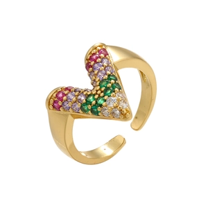 Close-up of golden V-shaped ring featuring colorful micro-pave zirconia stones