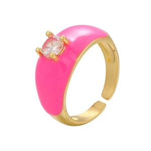 Detail view of gold adjustable ring featuring pink enamel finish and round zircon stone