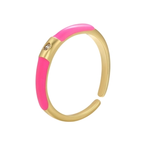 Adjustable golden ring with pink enamel detail and a round zircon stone on a white background