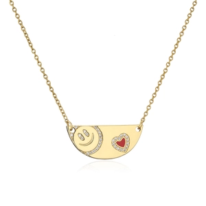 Gold necklace featuring a semi-circle pendant with a zircon smiley face and red heart charm